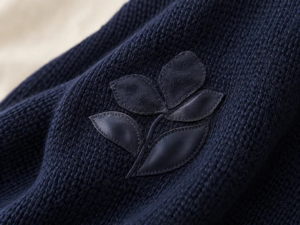 Mixed-material appliqué